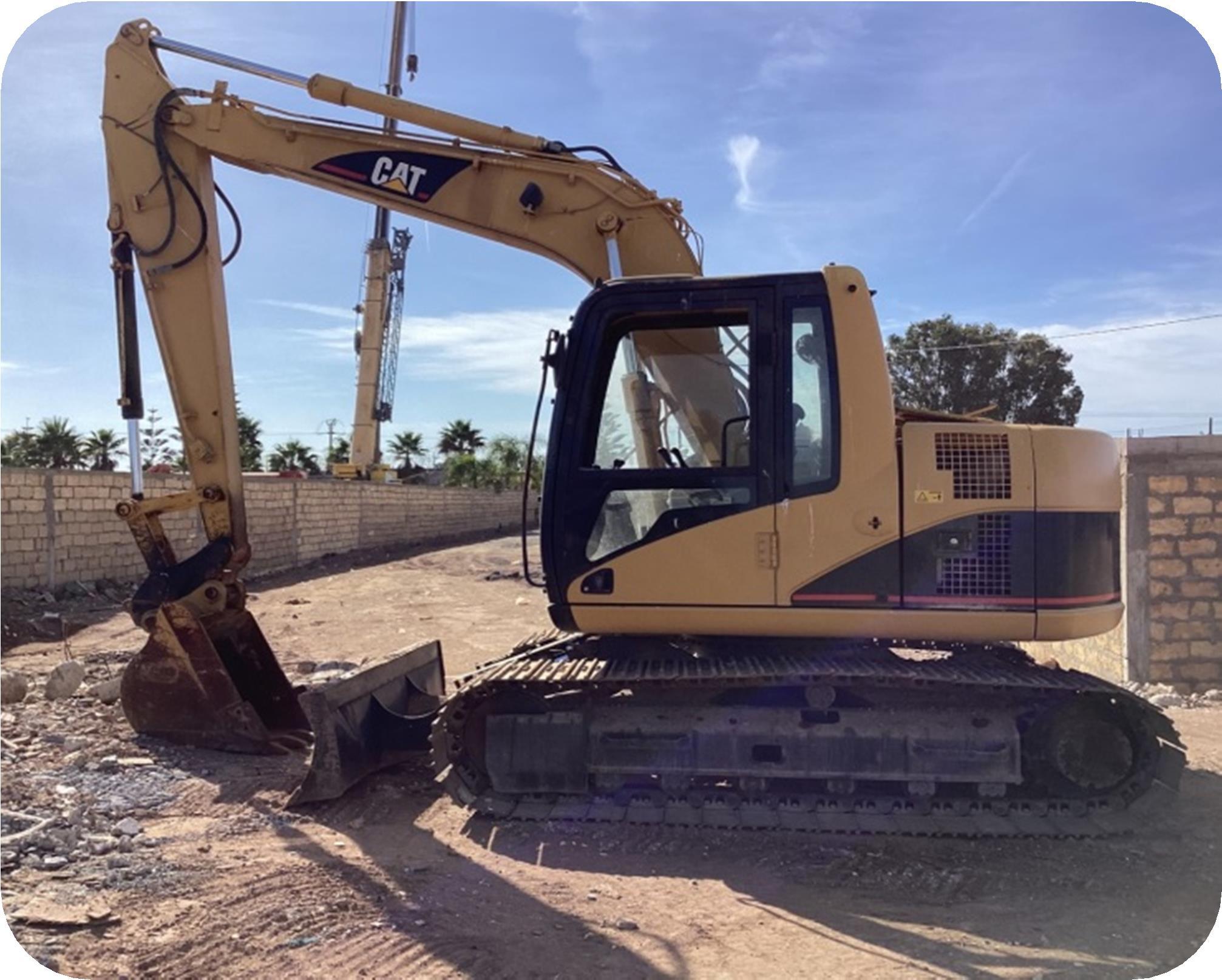 Africa Travaux Routiers-matériels a vendre-EXCAVATEUR 0311C-3