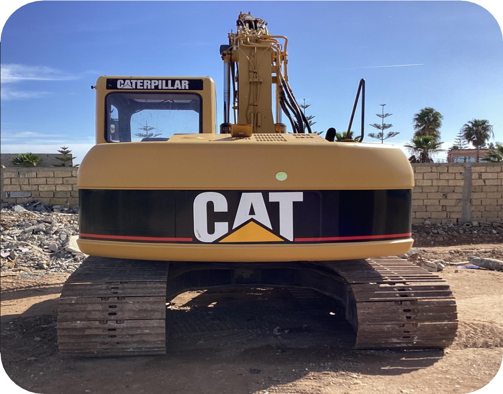 Africa Travaux Routiers-matériels a vendre-EXCAVATEUR 0311C